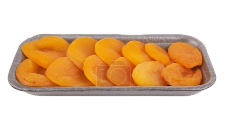 Téléchargez les photos : Abricots secs en boîte isolée sur fond blanc - en image libre de droit