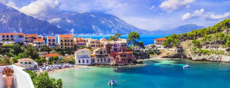 Photo for One of the most beautiful traditional greek villages - scenic Assos in Kefalonia (Cephalonia) with colorful floral streets.  Ionian islands , popular tourist destination in Greece - Royalty Free Image
