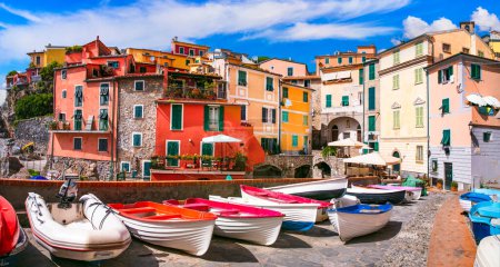 Photo for Italy, Liguria.  Scenic colorful traditional village Tellaro with old fishing boats. la Spezia province - Royalty Free Image