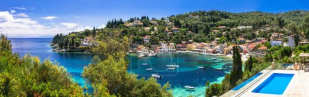Photo for Beautiful  Ionian islands of Greece. Authentic tranquil Paxos island. Scenic traditional Loggos fishing village - Royalty Free Image