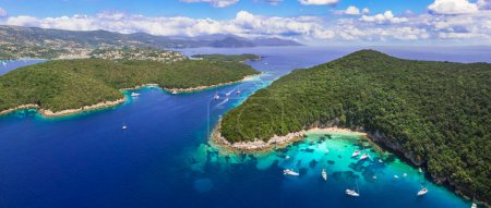 Sivota - stunning aerial drone video of turquoise sea known as Blue Lagoon and white sandy beaches. Epirus, Greece summer holiday