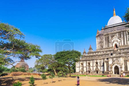 Photo for BAGAN, MYANMAR - JANUARY 21: 2019.Unidnetified people come to visit and make merit at Thatbyinnyu temple Majestic pagoda towering over the plains of Bagan on january 21,2019 in Bagan, Myanmar. - Royalty Free Image