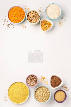 Photo for Ancient grain food. Gluten free, Healthy eating, dieting, balanced food concept. Cereals gluten-free, millet, quinoa, polenta, buckwheat, rice, chickpea on white background. - Royalty Free Image