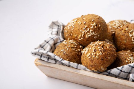 Photo for Gluten Free Homemade Bread Buns. Healthy eating, dieting, balanced food concept. Cereals gluten-free (millet, quinoa, buckwheat), psyllium husks,  flax seeds, sunflower seeds on marble background. - Royalty Free Image