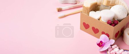 Photo for Natural eco friendly beauty skin care products concept. Zero waste bathroom, spa accessories on pink background. Eco friendly self care package for mothers womans day, valentines day, christmas, - Royalty Free Image