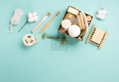 Photo for Natural eco friendly beauty skin care products concept. Zero waste bathroom, spa accessories on green mint background. Eco friendly self care package for family and friends for thankgiving, christmas, mothers day, valentines day. - Royalty Free Image