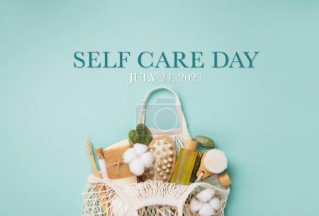 Photo for Happy Self Care Day. Natural eco friendly beauty skin care products concept. Zero waste bathroom and Organic spa accessories on green mint background. Handmade soap bars. Concept of me time - Royalty Free Image