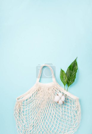 Photo for International plastic bag free day concept. Sustainable and Ecology lifestyle. Say no to plastic. Go green. Save nature. Reusable and recycling paper, textile cotton bags, mesh bags on blue background - Royalty Free Image
