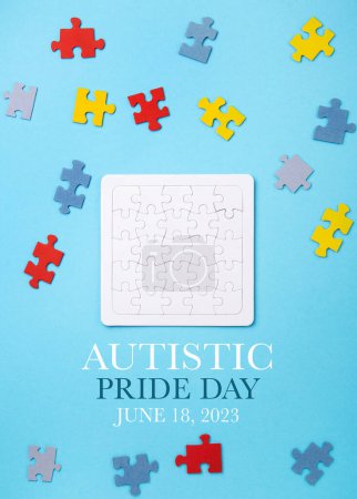 Photo for Autistic Pride Day or World Autism Awareness Day concept. Puzzles, symbol of awareness for autism spectrum disorder and colorful paints on blue background. Top view, copy space. - Royalty Free Image