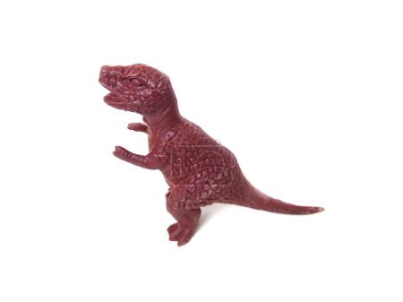 Foto de Primer plano del juguete de goma de dinosaurio Tyrannosaurus Rex. Juguete para niños aislado sobre fondo blanco. - Imagen libre de derechos