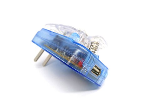 Phone charger isolated on white background. Close up of transparent blue mobile charger.