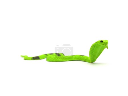 Foto de Cobra de goma de juguete de serpiente. Primer plano de juguete para niños aislado sobre fondo blanco. - Imagen libre de derechos
