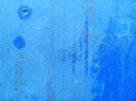 Old plastic texture background. Close up of faded blue plastic surface.