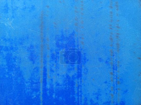 Old plastic texture background. Close up of faded blue plastic surface.