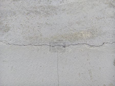 Foto de Fondo de textura de piso de hormigón agrietado. Vista superior de la nueva superficie del suelo de hormigón. - Imagen libre de derechos