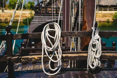 Photo for Ropes and rigging of an old caravel, ship of medieval explorers. - Royalty Free Image
