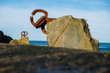 Foto de In San Sebastian there is a steel sculpture facing the sea created by Chillida. - Imagen libre de derechos