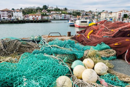 Foto de Pots, nets and fishing floats in a Cantabrian port. - Imagen libre de derechos