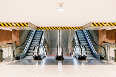Photo for Escalators, double and empty, seen from the front. - Royalty Free Image