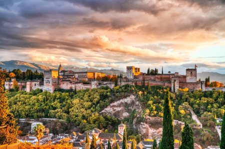 Alhambra Fortress Aerial View at Sunset with Amazing Clouds, Granada, Andalusia, Spain