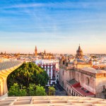 Seville City Skyline view with Space Metropol Parasol in the Foreground at Sunset, Seville, Spain  