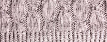 Photo for Background with knitting gray beige wool sweater with braid cable. Above overhead shot banner - Royalty Free Image