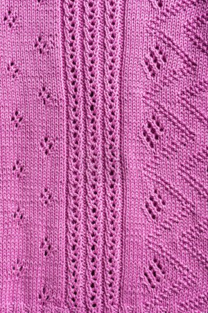 Photo for Handmade pink fuchsia lase knitting cotton texture background with knitted simple pattern. Top view of knitting clothes - Royalty Free Image