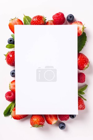 Photo for Summer background with paper blank, strawberry, raspberry and blueberry over white , top view, flat lay. Creative berry food concept with copy space - Royalty Free Image