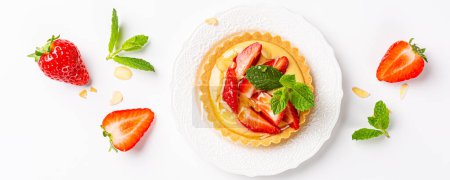 Photo for Flat lay banner with strawberry mini cake tartlet with vanilla custard, sprinkled with almond flakes and mint leaves over white background. Concept of homemade healthy sweet pastries. Top view - Royalty Free Image