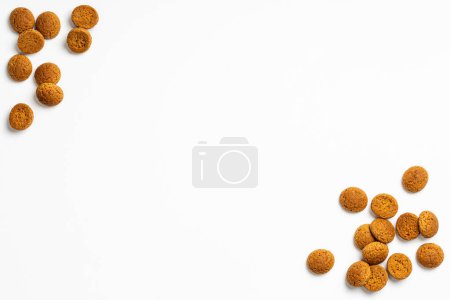 Photo for Dutch holiday Sinterklaas background with copy space for text. Kruidnoten cookies. Concept for children party Saint Nicolas day five december in the Netherlands. Top view, overhead. - Royalty Free Image