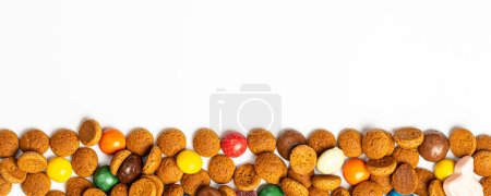 Photo for Banner for Dutch holiday Sinterklaas background with copy space for text. Kruidnoten cookies. Concept for children party Saint Nicolas day five december in the Netherlands. Top view, overhead. - Royalty Free Image