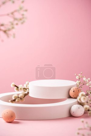 Photo for Composition with empty white podiums for products presentation or exhibitions on pink background with Easter quail eggs. Trend Concept with copy space. - Royalty Free Image