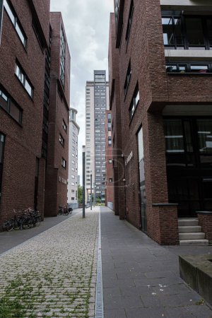 Photo for Eindhoven, The Netherlands - July 10, 2021: View of skyscraper de Regent in Eindhoven from Lichtstraat. The former territory of the phillips factory, now a residential area with multi-storey buildings - Royalty Free Image