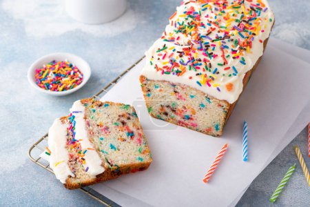 Photo for Birthday cake or funfetti pound cake with sprinkles and frosting - Royalty Free Image