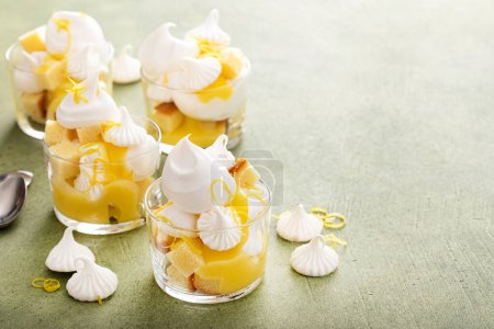 Photo for Lemon meringue parfait or trifle with pound cake, whipped cream and lemon curd - Royalty Free Image