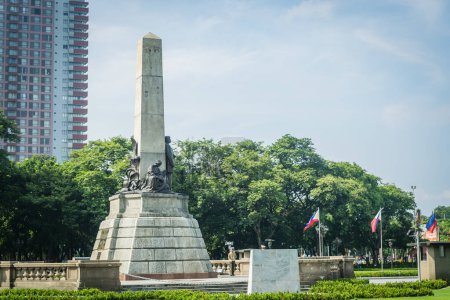 Photo for Rizal Park, Manila, Philippines July 2, 2014: The side view of Rizal's Monument at the Rizal Park in Manila, Philippines - Royalty Free Image