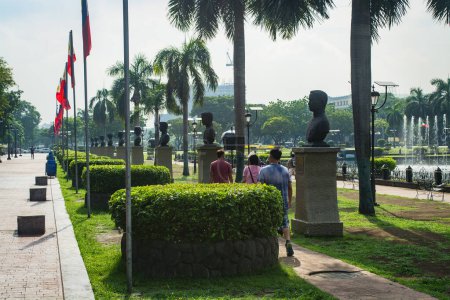 Photo for Rizal Park, Manila, Philippines July 2, 2014: Some of the heroes' busts along the path around the water fountain at the Rizal Park in Manila, Philippines - Royalty Free Image