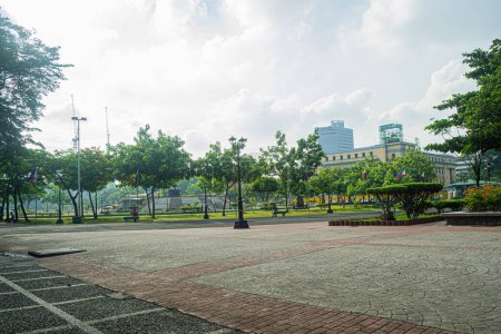 Photo for Rizal Park, Manila, Philippines July 2, 2014: Open field at the Rizal Park along Taft Ave., Manila, Philippines - Royalty Free Image