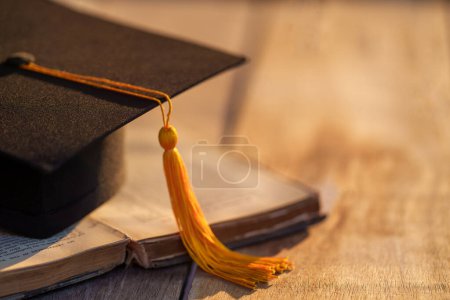 Photo for Graduation Cap university pace on wood table graduation concept - Royalty Free Image