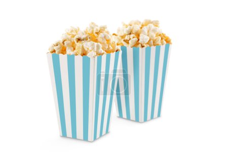 Photo for Two blue white striped carton buckets with tasty cheese popcorn, isolated on white background. Movies, cinema and entertainment concept. - Royalty Free Image