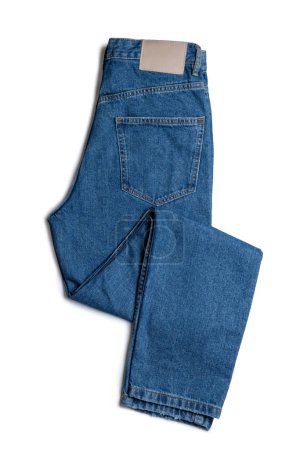 Foto de Blue jeans pants isolated on white background. Denim background, texture. Fashion concept, business, shopping, sale. Design detail, button and seams - Imagen libre de derechos