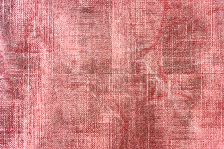 Téléchargez les photos : Tissu lin rouge naturel texture fond. Surface de tissu de lin, nappe, tapisserie d'ameublement, textiles rideaux. Vue de dessus, gros plan - en image libre de droit