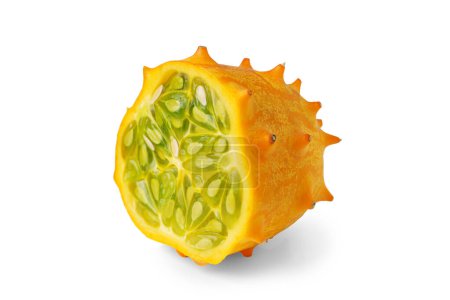 Kiwano fruit, green horned melon isolated on white background. Organic orange kiwano, African horned melon slice with green, jelly like inside with seeds close up.