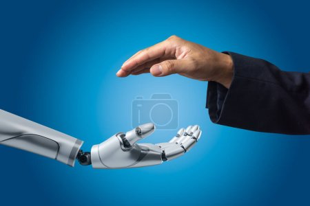 Foto de Inteligencia artificial AI mano robot blanco 3d representación y la mano de las personas en el fondo. - Imagen libre de derechos