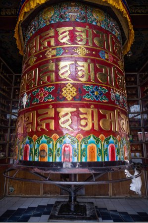Photo for A Prayer wheel or mani wheel at Jangchub Choeling Tibetan Monastery. Located in the Tibetan Refugee Camp know as Tashi Palkhel in Hemja, Pokhara, Nepal. - Royalty Free Image