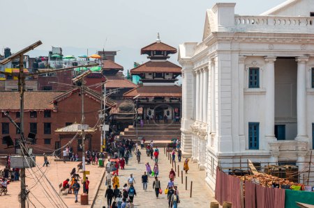 Photo for Kathmandu, Nepal - Apr 17, 2023: A landscape of a crowded local market near Kathmandu Durbar Square, The square is a historically UNESCO World Heritage Site in Kathmandu. - Royalty Free Image