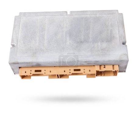 Plastic car engine control unit with metal elements on a white isolated background is the connecting center of various subsystems, units and assemblies. Monitoring the state of the moment. Spare part