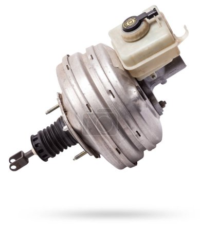 Black metal vacuum brake booster for repair and replacement on a car in a workshop on a white isolated background. Spare parts catalog for cars.