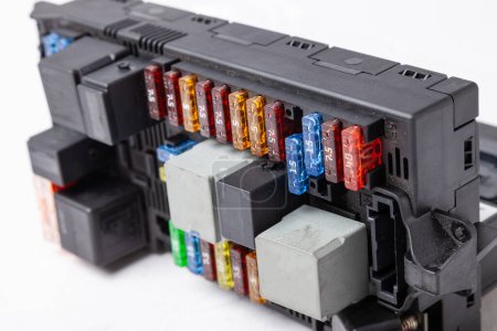 Automotive fuses box in different colors and each color is responsible for the specific value of the protection defined in amperes. Catalog of spare parts.