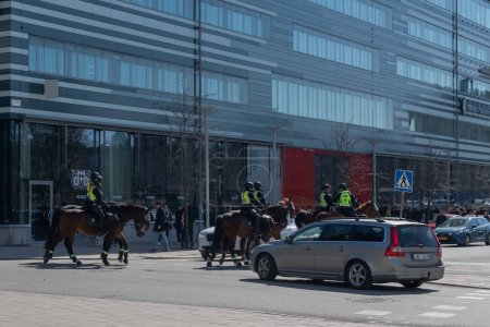 Photo for SOLNA, SWEDEN - APR 16 2023: Policehorses before the match between AIK vs Hammarby IF at Friends Arena in Solna. Final result 2-0 - Royalty Free Image